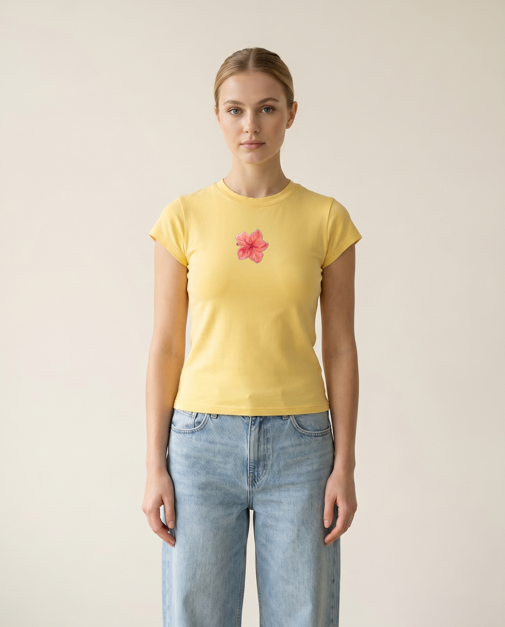 Butter Bloom fitted cap-sleeve tee with hand-painted hibiscus — front — The Dirty Laundry Pakistan