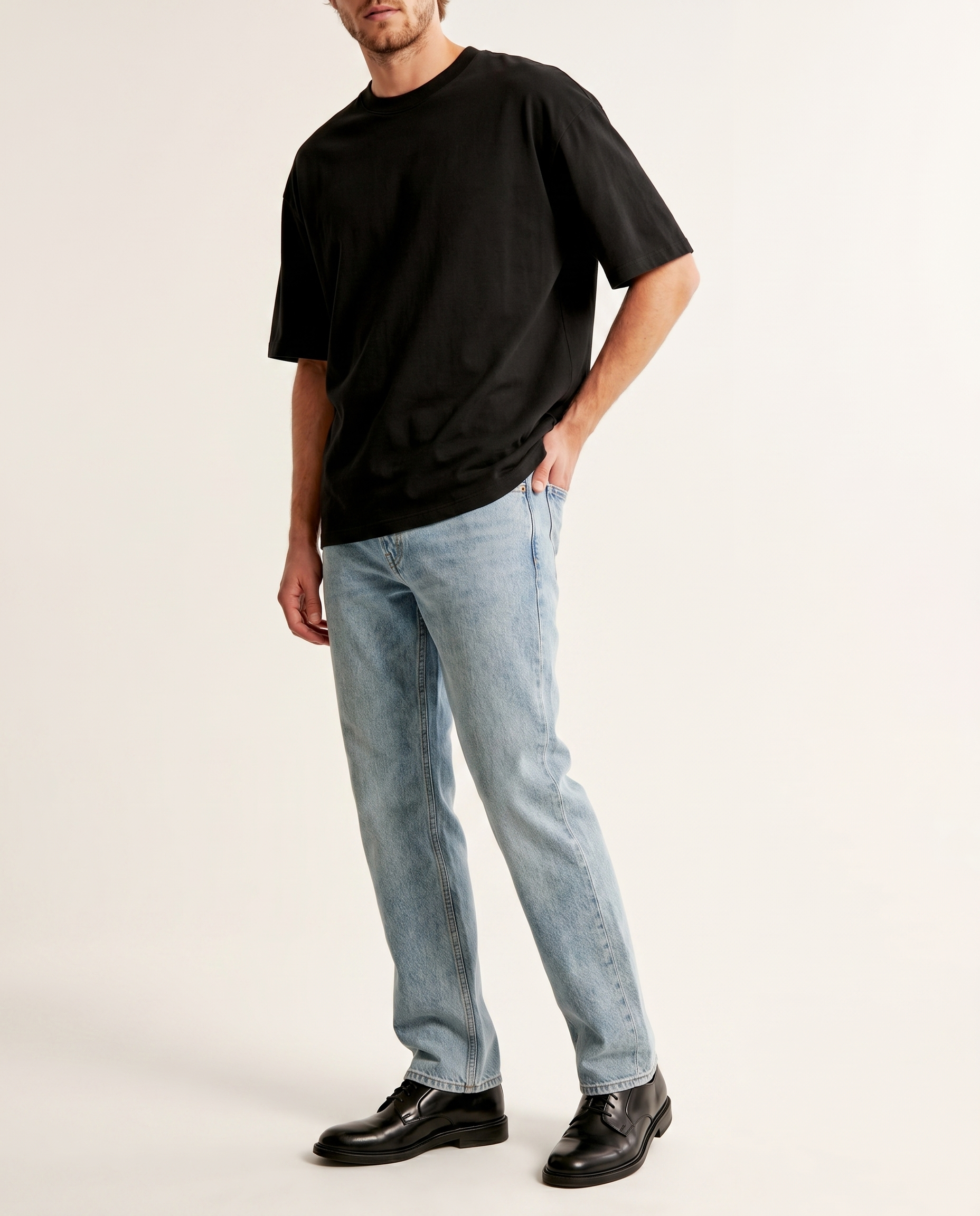 Coastal medium-blue straight-leg denim jeans — The Dirty Laundry Pakistan — on model