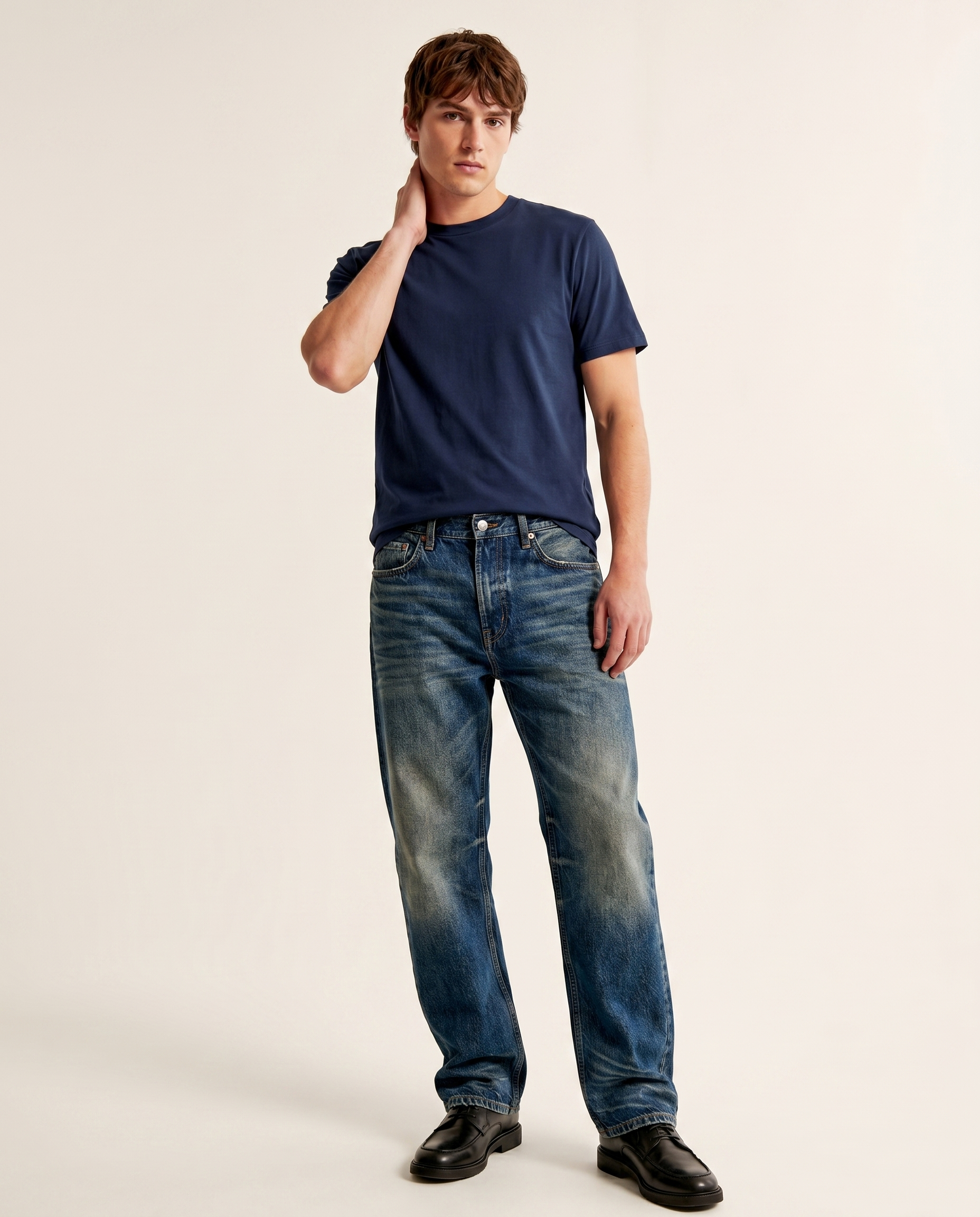 Deep indigo wide-leg denim jeans — The Dirty Laundry Pakistan — on model