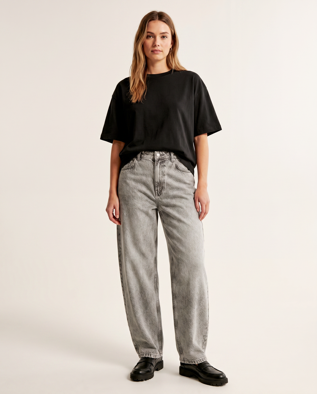 Stone grey baggy denim jeans — The Dirty Laundry Pakistan — on model