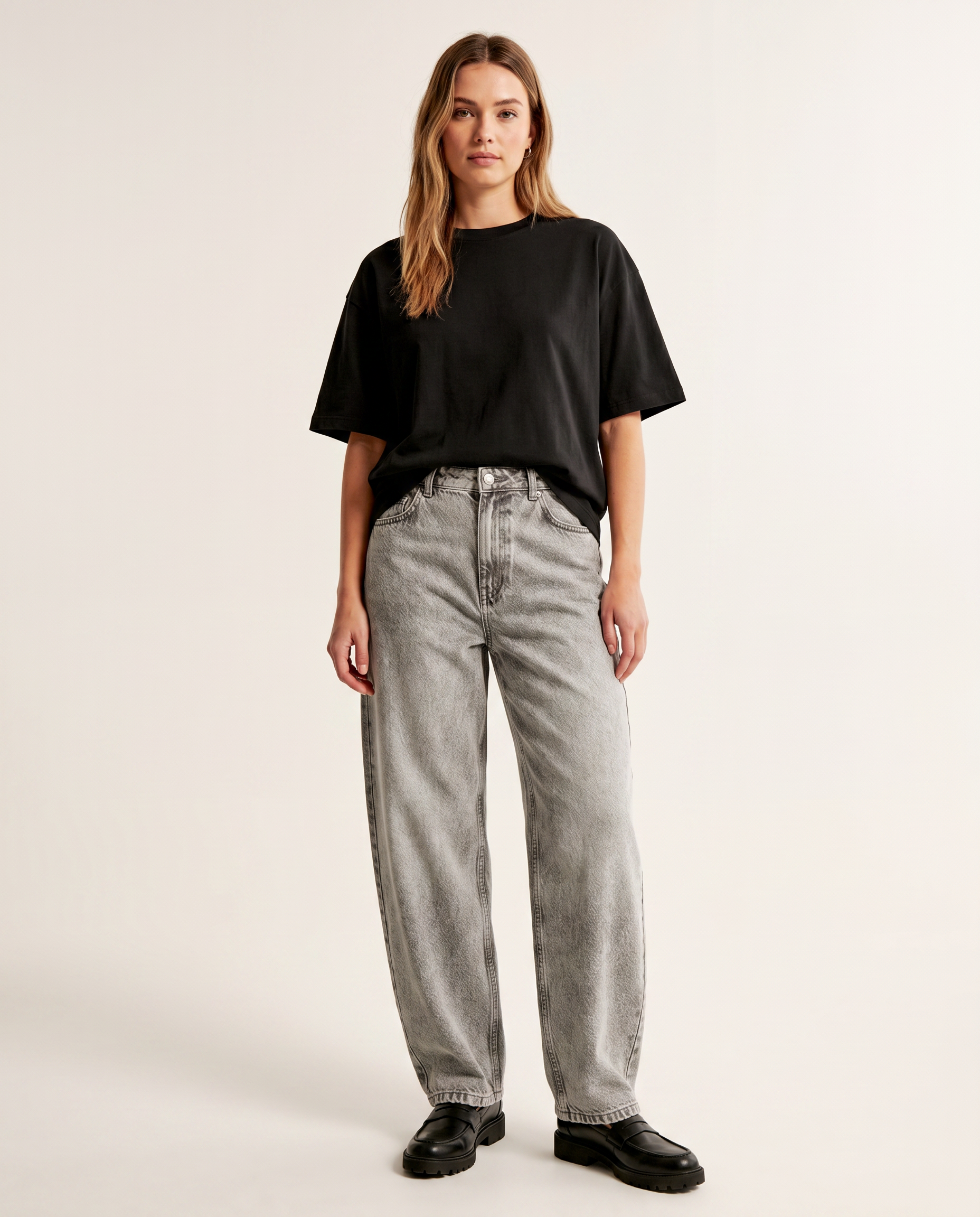 Stone grey baggy denim jeans — The Dirty Laundry Pakistan — on model