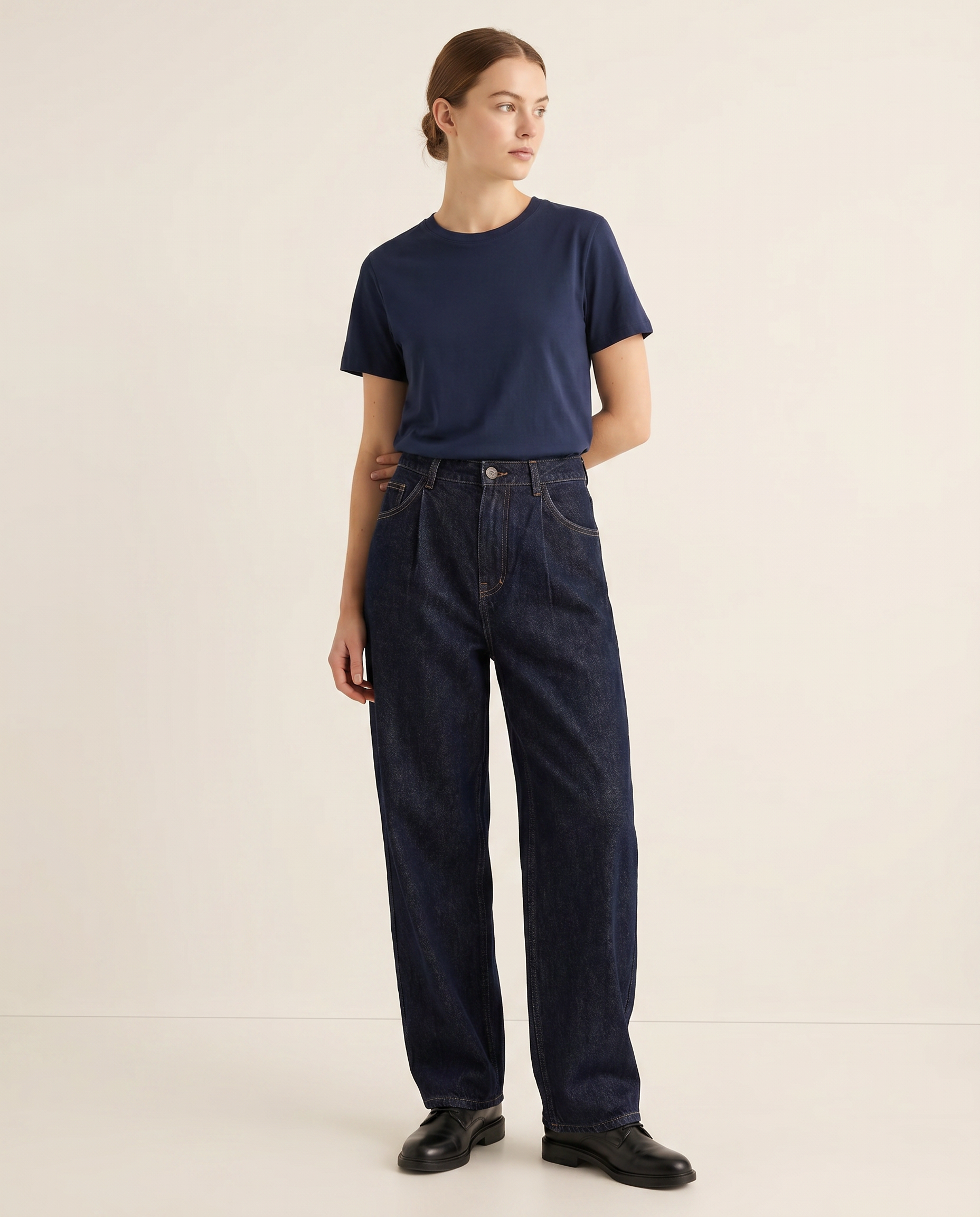 Raw indigo straight-leg denim jeans — The Dirty Laundry Pakistan — on model