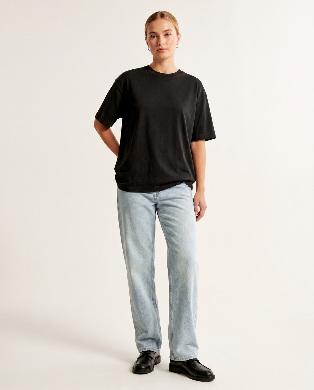 Sun bleach light-wash baggy denim jeans — The Dirty Laundry Pakistan — on model