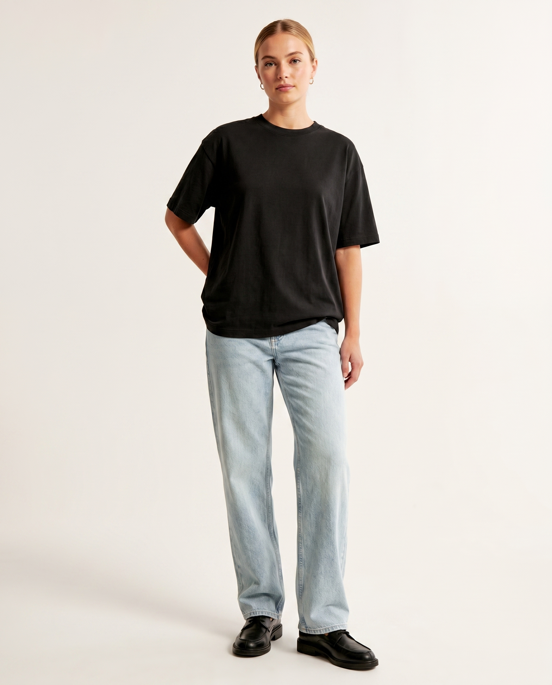 Sun bleach light-wash baggy denim jeans — The Dirty Laundry Pakistan — on model
